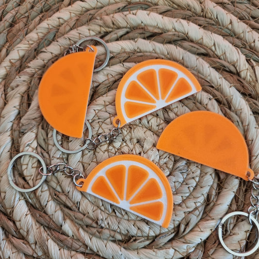 Llavero rodaja de naranja solidario – Apoya la investigación contra la FSHD