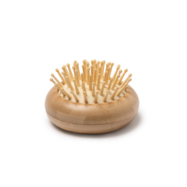 Cepillo plegable de bambú con espejo · Crudo