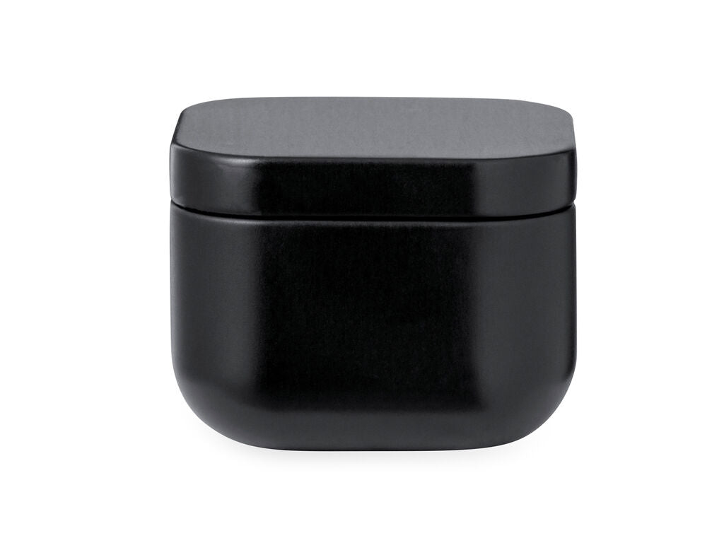 Vela aromática de vainilla en lata · Negro