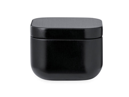 Vela aromática de vainilla en lata · Negro