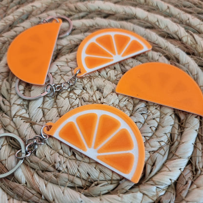Llavero rodaja de naranja solidario – Apoya la investigación contra la FSHD