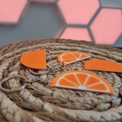 Llavero rodaja de naranja solidario – Apoya la investigación contra la FSHD